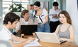 © JackF - Several managers work together in a modern office. A well-coordinated management team