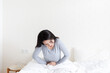 © mei - A young Chinese woman with abdominal pain