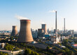 © 晨啸 周 - Wuhan Thermal Power Plant featuring gaint nuclear-style cooling towers and smokestacks, emitting heavy steam. It uses ultra-low emission, cogeneration for green energy transition. China.