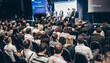 © Arslan Saeed - Business conference audience attending professional panel discussion in corporate seminar hall photo