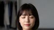 © HariBudi - Peaceful Asian Woman Eyes Closed Serene Meditation Inner Peace Tranquility Relaxing