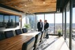 © reno - Two Businessmen Discuss Business in a Modern Conference Room