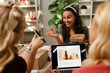 © milanmarkovic78 - Engagement Between Small Business Owners Discussing Products and Online Marketing Strategies in a Workspace