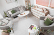 © Pixel-Shot - Armchairs with cushions, coffee tables, sofa and chest of drawers in interior of living room