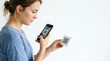© Guilherme - A woman scanning a QR code with her smartphone in a clean environment.