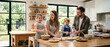 © Maxime - Famille heureuse cuisinant ensemble dans une cuisine lumineuse