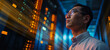 © Parisa - Asian Visionary Data Center Specialist Surrounded by Blue and Orange Server Lights