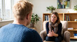© Hifzhan Graphics - Professional woman counselor speaking with young man in office