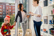 © Westend61 - Smiling mother with baby bringing girl to kindergarten