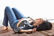 © IndiaPix - Young girl lying on the pier and taking sunbath near the sea