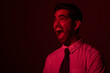 © IndiaPix - Portrait of an angry young man looking away and shouting