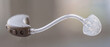 © MaksymFilipchuk - Behind the ear hearing aid with clear tubing and silicone ear dome assistive device