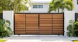 © Digitalogika Studio - Modern residential driveway gate made of horizontal wooden slats and black metal frame.