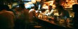 © Snowstudio - Blurred bar counter with people socializing in dimly lit atmosphere