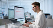 © Andrey Popov - Young Male Doctor Is Reviewing Patient Medical Records