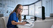 © Andrey Popov - Woman Reviews Healthcare Claims On Computer
