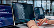 © Andrey Popov - Young Woman Coding Software On Laptop