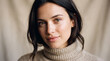 © Imagecenter - Close-up portrait of a beautiful woman with dark hair wearing a cozy turtleneck sweater, ideal for natural beauty and winter lifestyle concepts