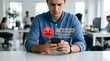 © Arka - Disappointed Businessman Receiving Negative One Star Online Review on Smartphone in Office