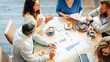 © Rawpixel.com - Collaborative business meeting with technology