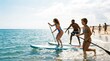 © velikiyzayats - Diverse young adults paddleboarding in ocean water at tropical beach, active lifestyle concept, friends enjoying summer vacation, water sports and fitness activity