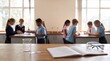 © Morrina - A science notebook, beaker and safety goggles await discovery on a lab table while students explore STEM concepts, perfect for back-to-school education