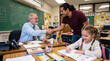 © Nai - Meeting between a teacher and a parent in a classroom of young students during a school day