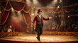 © Marina - Ringmaster in classic red costume presenting a show on circus arena