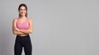 © MSTKHADIZA - Portrait of a cheerful young woman with brown hair in a ponytail wearing a pink sports bra ad social media download thambnail poster web template event festival 2026 2027 2028
