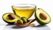 © Charles - healthy organic olive oil in a spoon and glass served with fresh green olives and ripe avocado halves for a nutritious raw vegetarian diet isolated on white