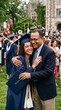 © Azor - Proud father embraces daughter in graduation gown holding diploma on college campus