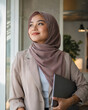© Evando - Professional woman in business casual blazer with confident upward gaze, soft warm window lighting, authentic ambitious professional moment, cinematic modern photography