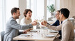© 123sasha - Business team toasting at lunch in restaurant