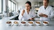 © NurbaniRa - Food Scientists Conducting Sensory Evaluation and Taste Test of Cereal in Laboratory Setting