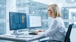 © BZXO - Experienced nurse working with medical records and clinical coding on desktop screens.