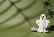 © Fahad - Halloween ghost, ceramic figurine, ghost figurine, gold spiders, silver leaves, autumn decor, spooky holiday, top view, spook season, ceramic ghost, party ornament, dark green, halloween decor, season