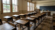 © roes - Empty vintage classroom with wooden desks and chalkboard.