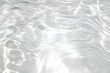 © btiger - shimmering silver water surface with soft ripples and gentle light reflections, serene and calming