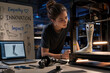© ALVA - Young Female Engineer Working with 3D Printer and Robotic Arm inModern Lab for STEM Education and Innovation Concept
