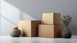 © Juan - Minimal Cardboard Boxes with Decorative Vase Arrangement