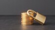 © KRAM - Golden padlock leaning against a stack of gold coins on dark background, asset security concept