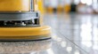 © dmmarychev - Close up professional floor scrubbing machine on polished floor