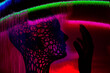 © Westend61 - Futuristic robot avatar in neon cyberspace with glitch effect