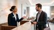 © Eric - Courteous Hotel Receptionist Uses an Asking Permission Gesture Before Assisting a Guest Creating a Welcoming Hospitality Experience With Professional Service