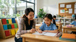 © edivaldo - Teacher Supporting Student Learning