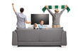 © Ljupco Smokovski - Kid watching football on tv with adults