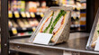 © Tsalsa - Fresh triangular turkey sandwich packaged in a clear plastic container.
