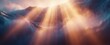 © Qrisio - Cinematic volumetric sunset with dramatic mountainous horizon, ambient film background for trailers and presentations