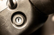 © Anton - Close view of worn car ignition key slot showing scratches from everyday vehicle use highlighting aging automotive component frequent operation and realistic ownership concept