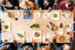 © Rawpixel.com - Diverse group enjoying meal together